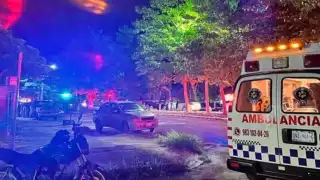 La pareja logró refugiarse antes de resultar herida