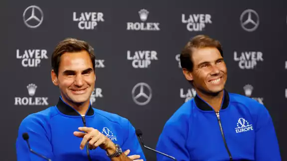 Federer se despide de Nadal fuera de la cancha