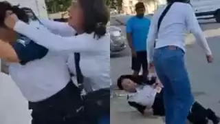 Vendedora ambulante y guardia de seguridad protagonizan riña afuera de un hospital de Playa del Carmen: VIDEO 