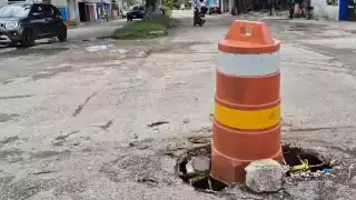 Falla recurrente en drenaje pluvial causa daños al pavimento en Champotón