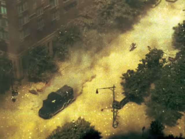 Se aprecia un camión de la Policía y una moto cruzando una de las calles cercanas.