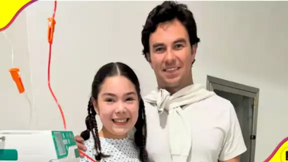 Checo y la pequeña fan