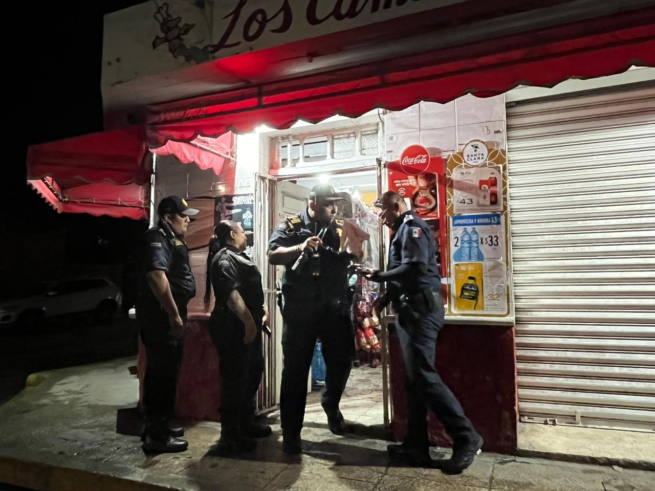 Agentes policiacos resguardan el sitio en Progreso Agentes policiacos resguardan el sitio en Progreso