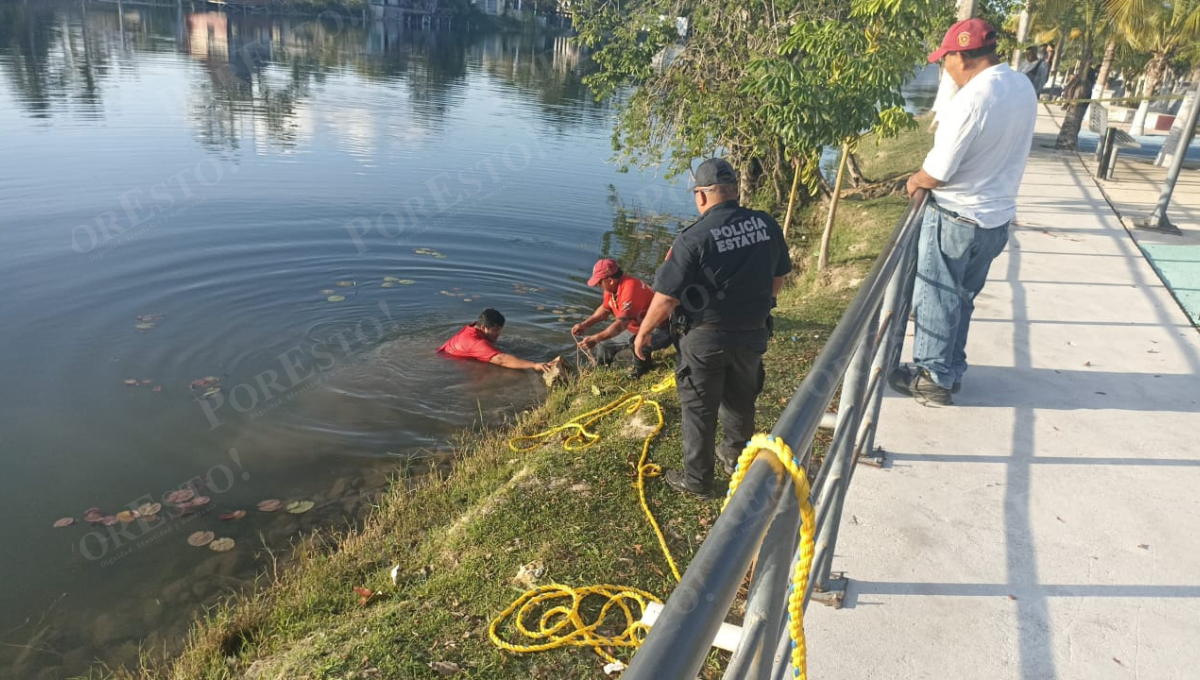 Protección Civil logró rescatar el cadáver sumergido.