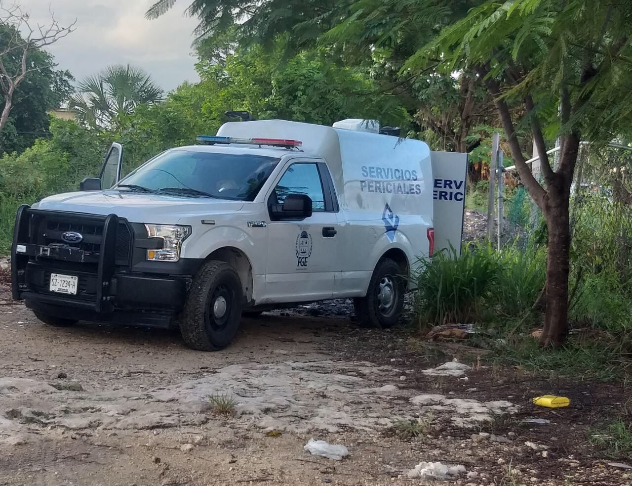 Una patrulla de la Policía Quintana Roo acordonó la zona del hallazgo del cuerpo en la Región 245 de Cancún Una patrulla de la Policía Quintana Roo acordonó la zona del hallazgo del cuerpo en la Región 245 de Cancún