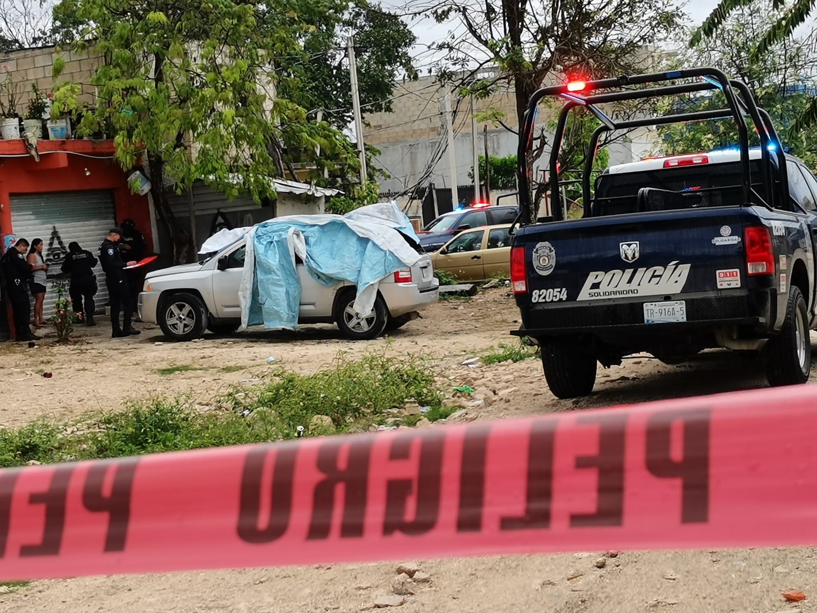 El hombre baleado fue atendido por paramédicos en el sitio del ataque armado en Playa del Carmen, sin que requiriera ser llevado a un hospital El hombre baleado fue atendido por paramédicos en el sitio del ataque armado en Playa del Carmen, sin que requiriera ser llevado a un hospital