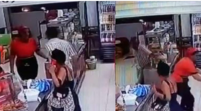 El delincuente intentó llevarse todo el dinero. Foto: Captura de pantalla. El delincuente intentó llevarse todo el dinero. Foto: Captura de pantalla.
