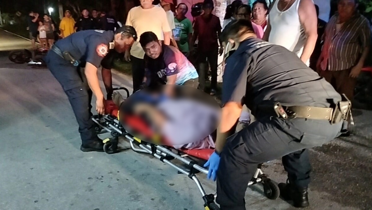 Choque entre bicicleta y motocicleta deja a dos lesionados en Sacapuc, Motul